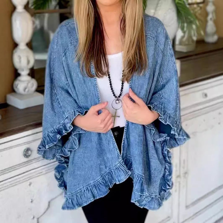 Damer avslappnad jeans-cape med voluminösa volangdetaljer Mirla-Eva Jonsson