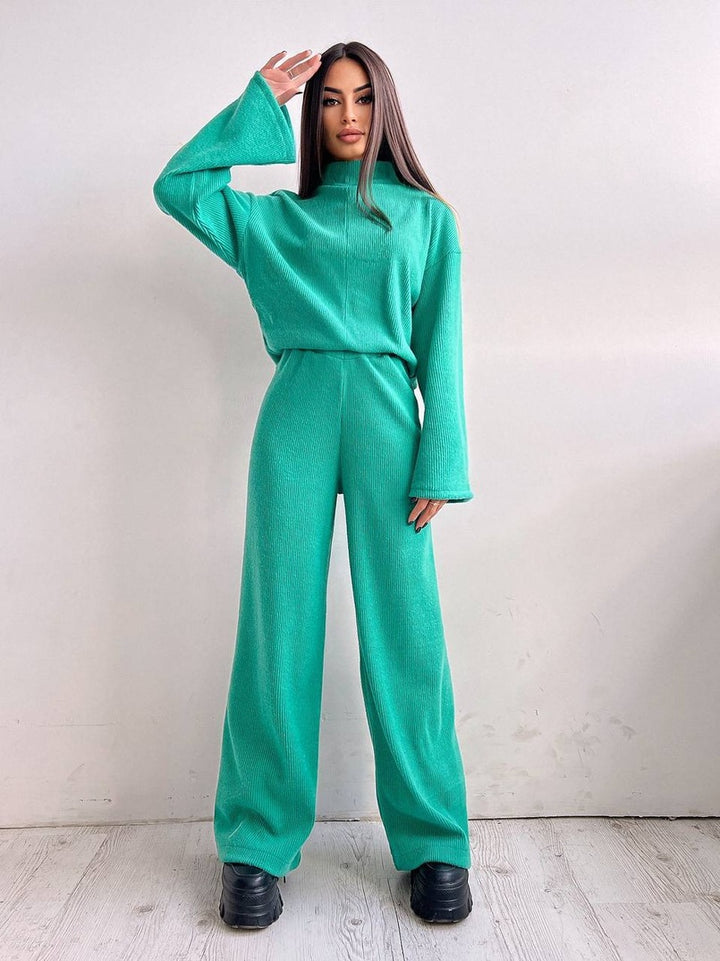 Damer avslappnad jumpsuit i mjukt rippat material Mirla-Eva Jonsson