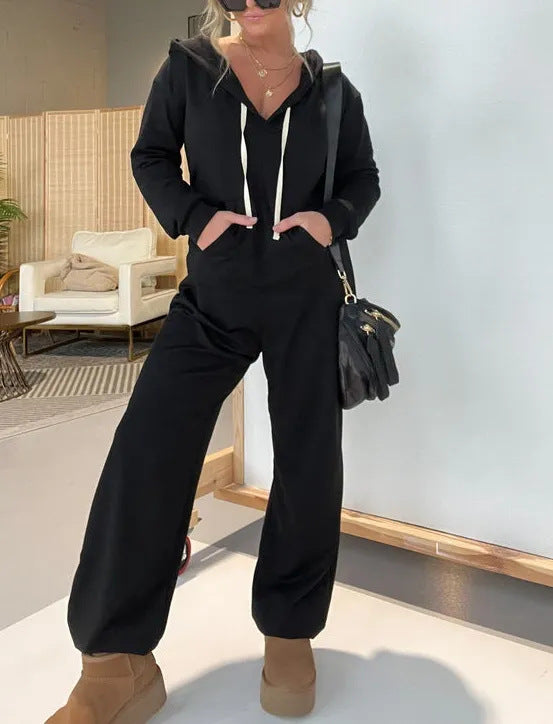 Damer avslappnad jumpsuit med djupt V-hals och huva Mirla-Eva Jonsson