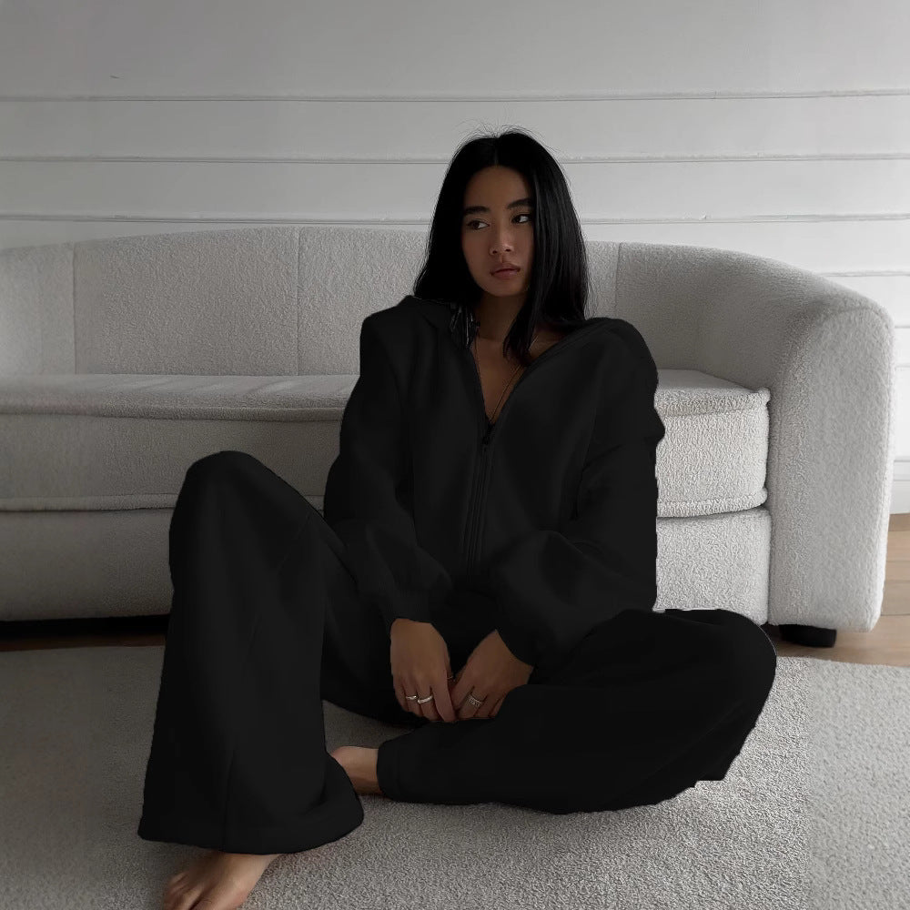 Damer avslappnad jumpsuit med huva och dragkedja Mirla-Eva Jonsson