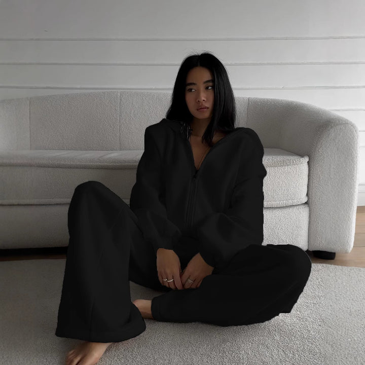 Damer avslappnad jumpsuit med huva och dragkedja Mirla-Eva Jonsson
