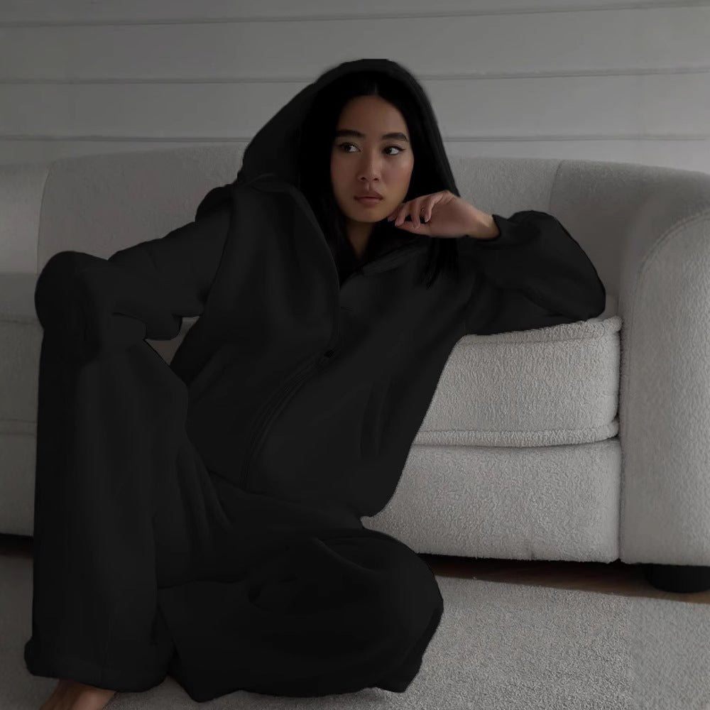 Damer avslappnad jumpsuit med huva och dragkedja Mirla-Eva Jonsson