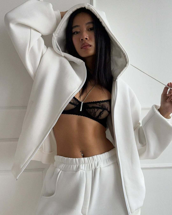 Damer avslappnad jumpsuit med huva och dragkedja Mirla-Eva Jonsson