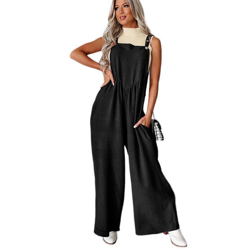 Damer avslappnad jumpsuit med vidskuren ben och dekorativa knapppunkter Eva Jonsson-Eva Jonsson