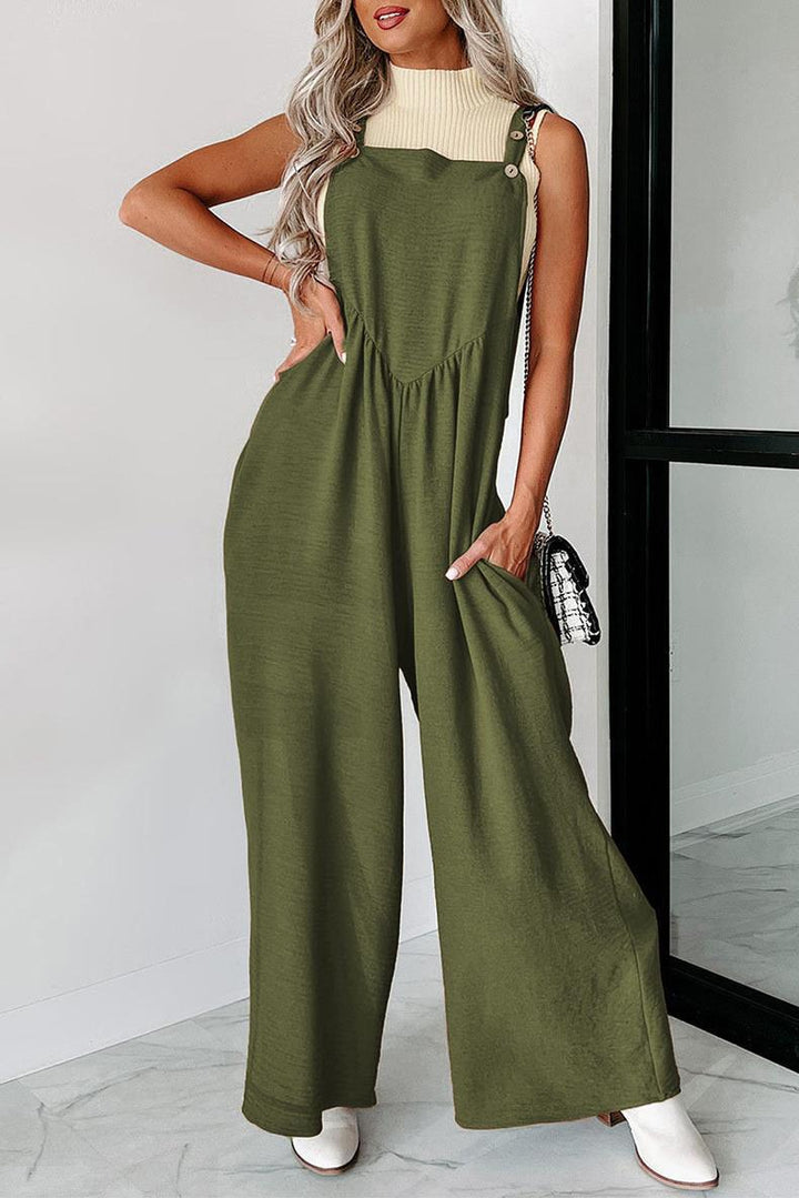 Damer avslappnad jumpsuit med vidskuren ben och dekorativa knapppunkter Eva Jonsson-Eva Jonsson