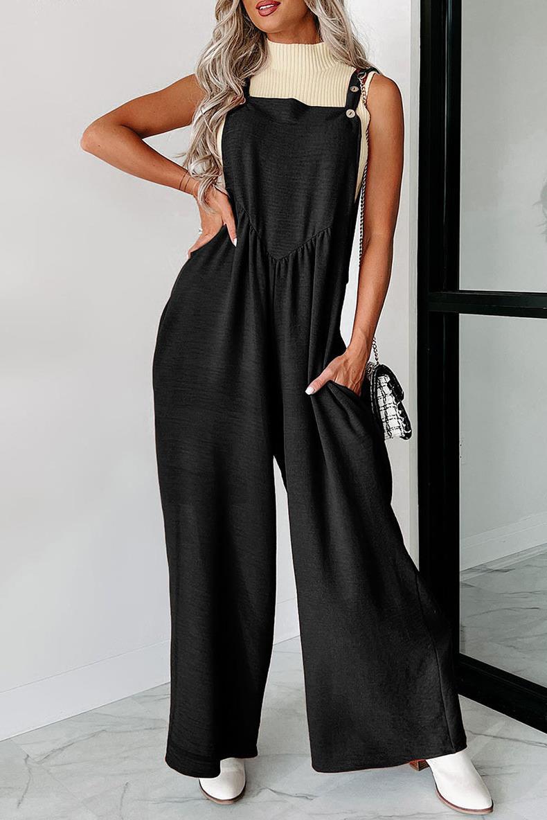 Damer avslappnad jumpsuit med vidskuren ben och dekorativa knapppunkter Eva Jonsson-Eva Jonsson