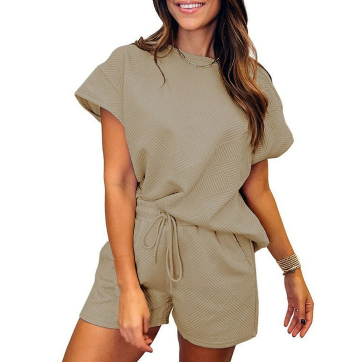 Damer avslappnad jumpsuit-set med elastisk midja och strukturerad design Mirla-Eva Jonsson