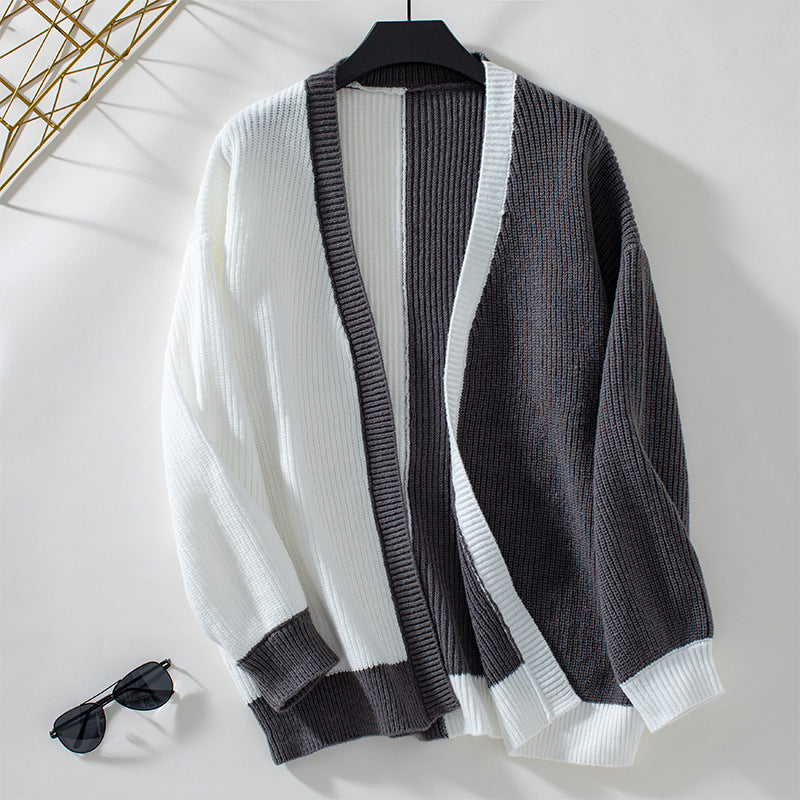 Damer avslappnad kofta med asymmetrisk design och strukturerad stickning Mirla-Eva Jonsson