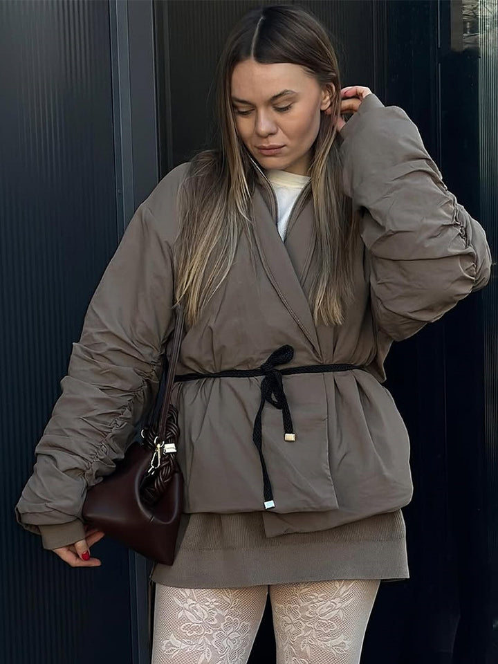 Damer avslappnad kortjacka med midjebälte och voluminösa ärmar Mirla-Eva Jonsson