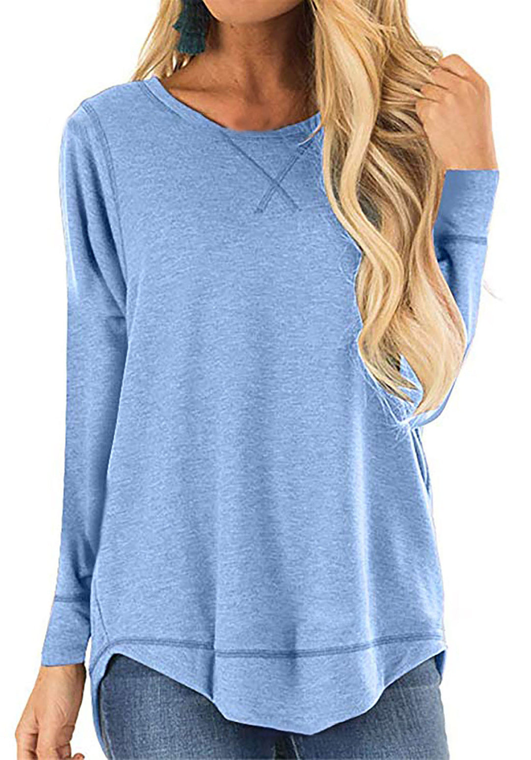Damer avslappnad långärmad t-shirt i andningsbar bomull med trendiga sidofickor Mirla-Eva Jonsson