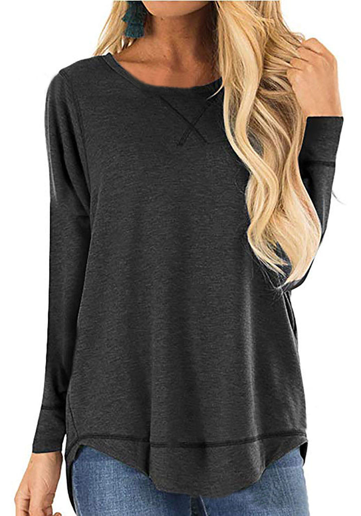 Damer avslappnad långärmad t-shirt i andningsbar bomull med trendiga sidofickor Mirla-Eva Jonsson