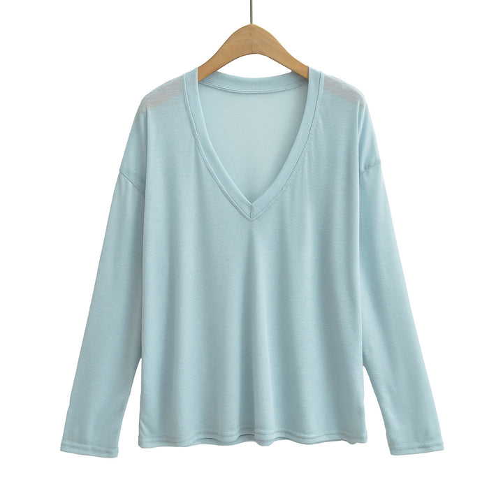 Damer avslappnad långärmad t-shirt med djup V-hals Mirla-Eva Jonsson