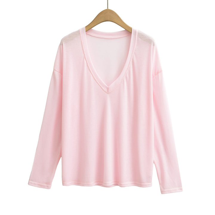 Damer avslappnad långärmad t-shirt med djup V-hals Mirla-Eva Jonsson