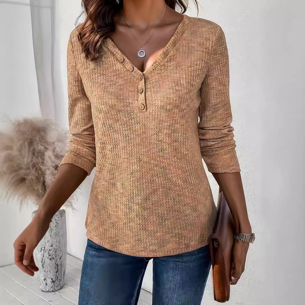 Damer avslappnad långärmad t-shirt med knapppdetaljer Mirla-Eva Jonsson