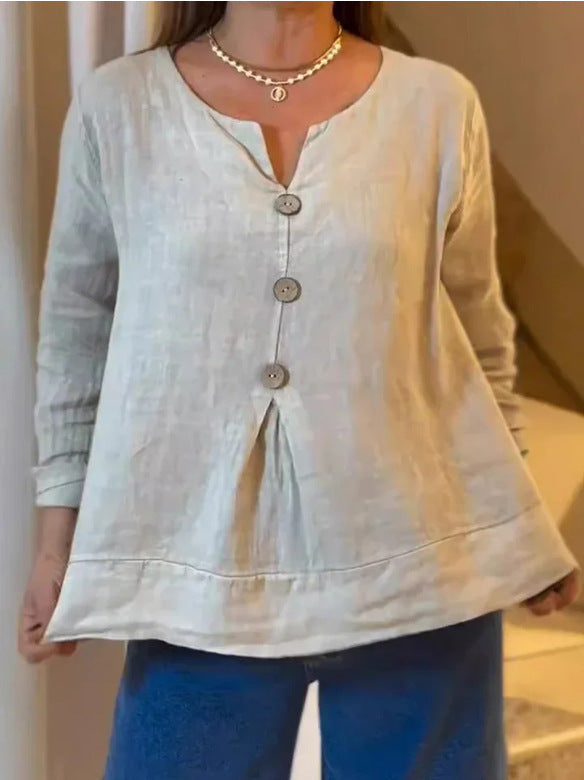 Damer avslappnad linneblus med genomgående knapplist och lätt V-ringning Mirla-Eva Jonsson