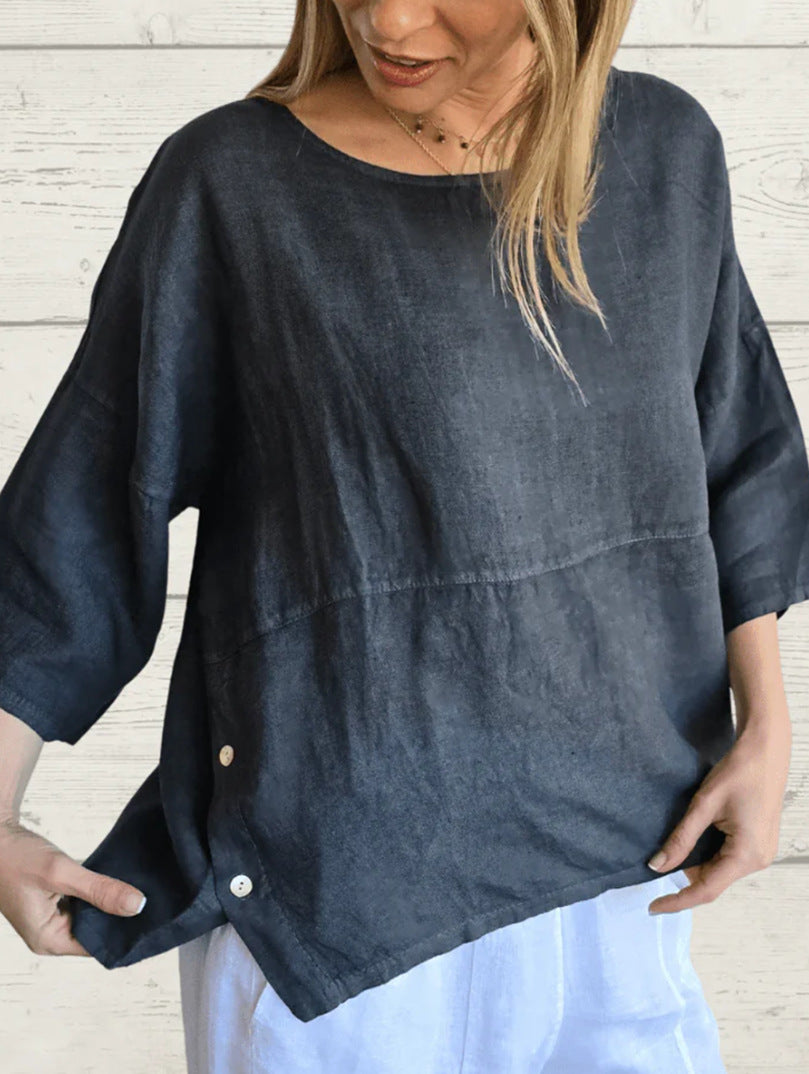 Damer avslappnad linneöverdel med asymmetrisk fåll och knapppdetaljer Mirla-Eva Jonsson