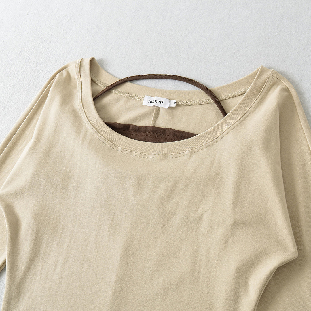 Damer avslappnad longsleeve-top med asymmetrisk skärning Mirla-Eva Jonsson