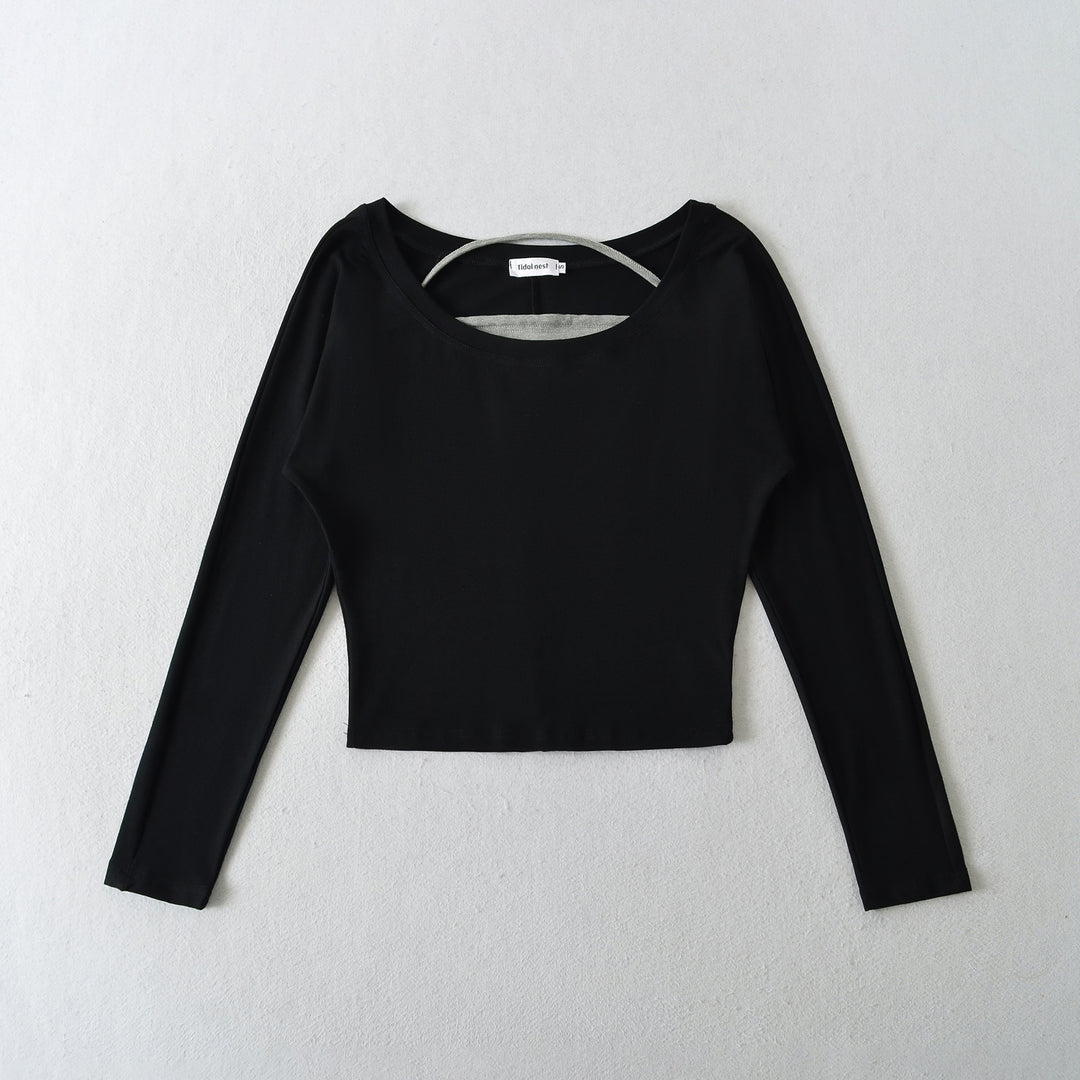 Damer avslappnad longsleeve-top med asymmetrisk skärning Mirla-Eva Jonsson