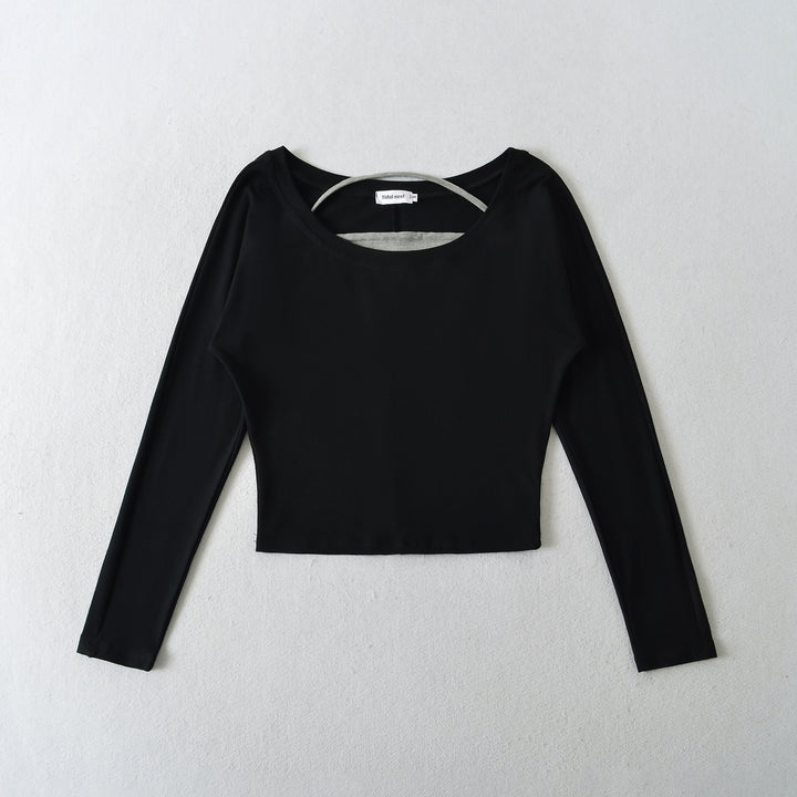 Damer avslappnad longsleeve-top med asymmetrisk skärning Mirla-Eva Jonsson