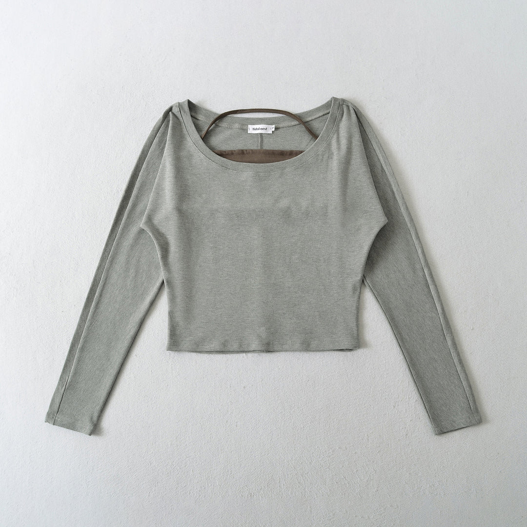 Damer avslappnad longsleeve-top med asymmetrisk skärning Mirla-Eva Jonsson