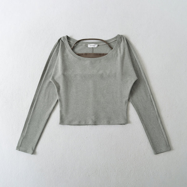 Damer avslappnad longsleeve-top med asymmetrisk skärning Mirla-Eva Jonsson