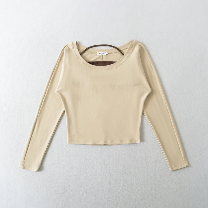Damer avslappnad longsleeve-top med asymmetrisk skärning Mirla-Eva Jonsson