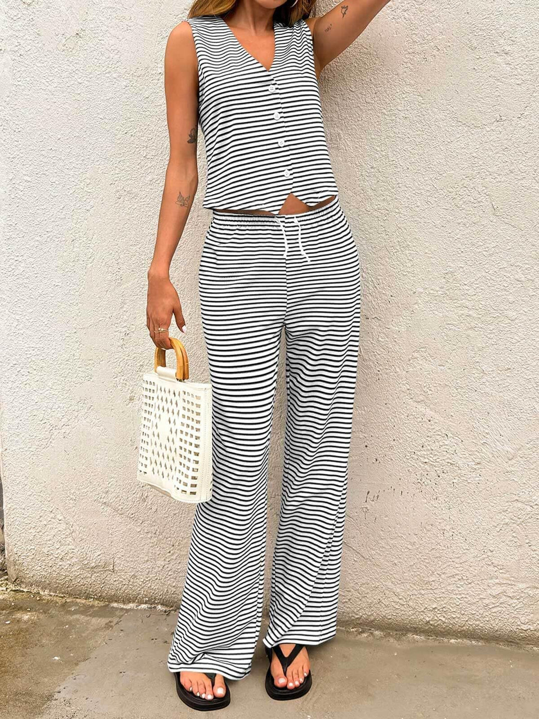 Damer avslappnad och andningsbar jumpsuit-set med knapprad Mirla-Eva Jonsson