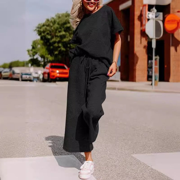 Damer avslappnad och luftig jumpsuit-set med vida ben och midjeåtdragning Mirla-Eva Jonsson