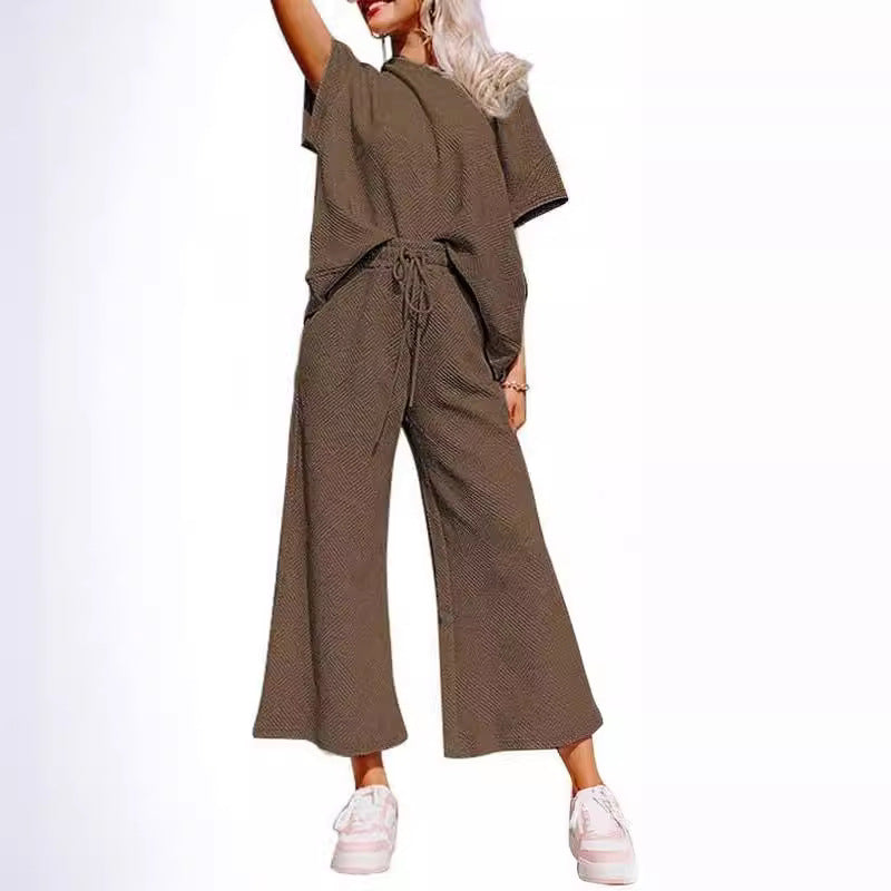 Damer avslappnad och luftig jumpsuit-set med vida ben och midjeåtdragning Mirla-Eva Jonsson