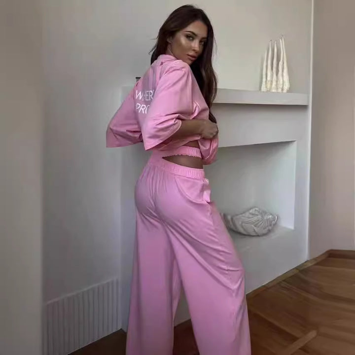 Damer avslappnad oversized T-shirt med kreativ text Mirla-Eva Jonsson