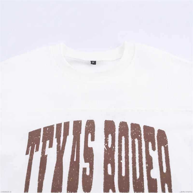 Damer avslappnad oversized T-shirt med kreativt tryck Mirla-Eva Jonsson