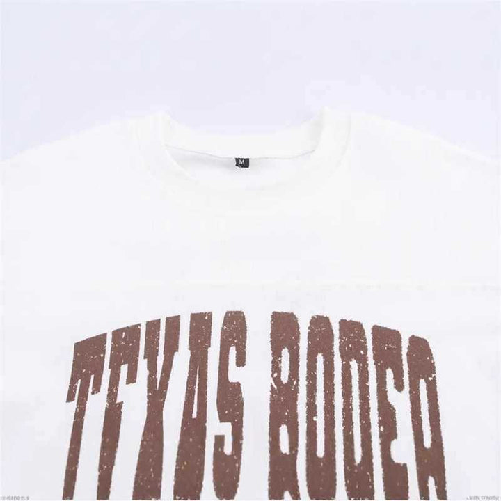 Damer avslappnad oversized T-shirt med kreativt tryck Mirla-Eva Jonsson