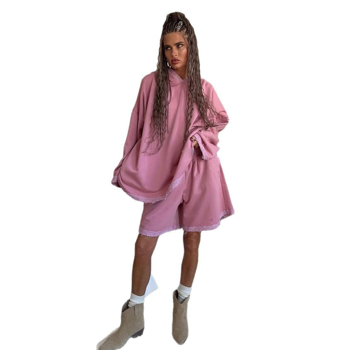Damer avslappnad oversized hoodie-set med fransiga accenter Mirla-Eva Jonsson