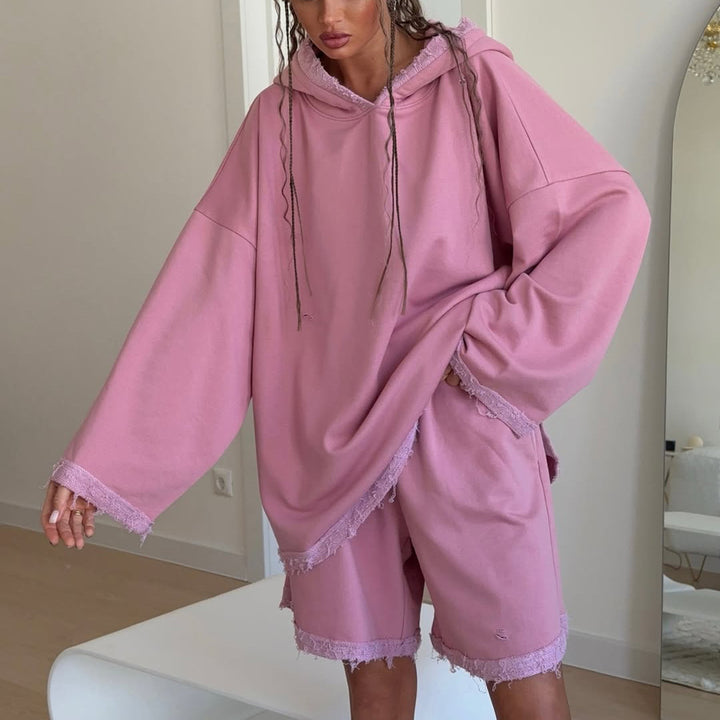 Damer avslappnad oversized hoodie-set med fransiga accenter Mirla-Eva Jonsson