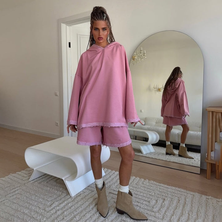 Damer avslappnad oversized hoodie-set med fransiga accenter Mirla-Eva Jonsson