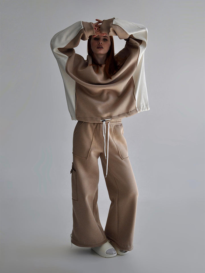 Damer avslappnad oversized sweatshirt med hög krage och bekväma cargo byxor Mirla-Eva Jonsson