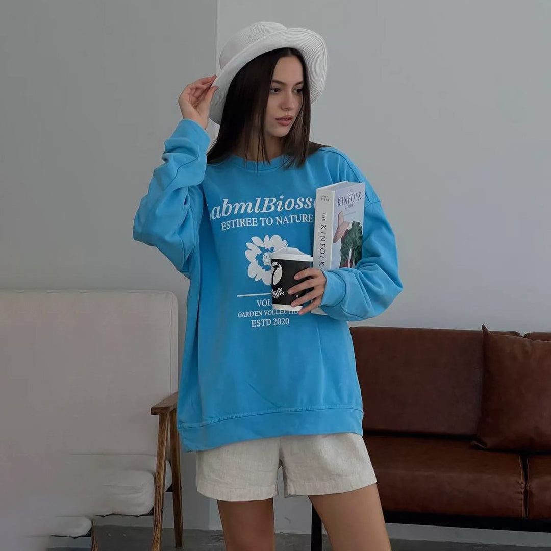 Damer avslappnad oversized sweatshirt med kreativ blomstertryck Eva Jonsson-Eva Jonsson