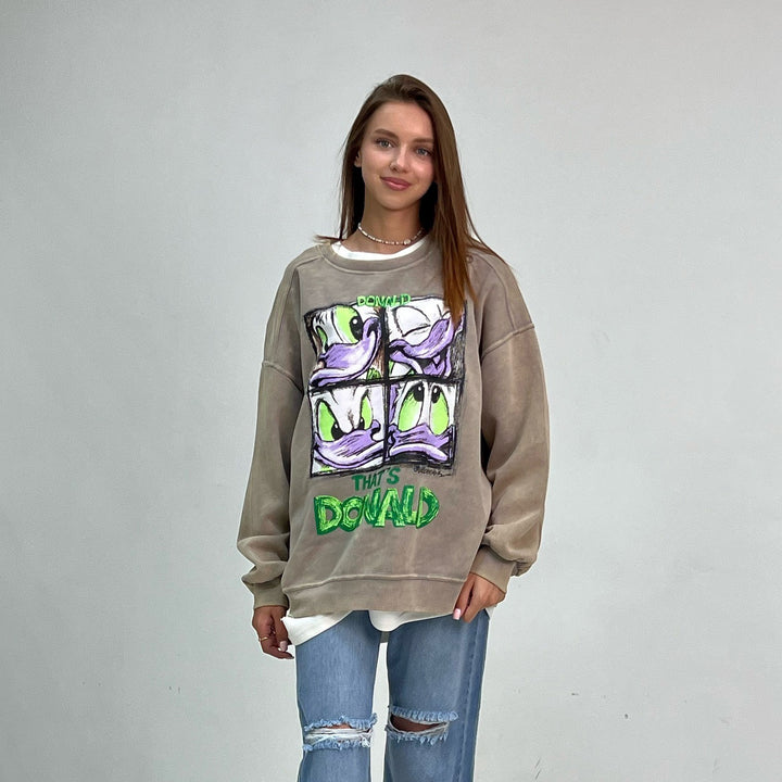 Damer avslappnad oversized sweatshirt med kreativ cartoon-tryck Mirla-Eva Jonsson