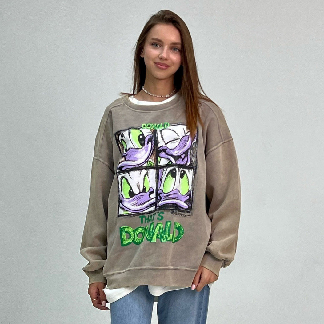 Damer avslappnad oversized sweatshirt med kreativ cartoon-tryck Mirla-Eva Jonsson