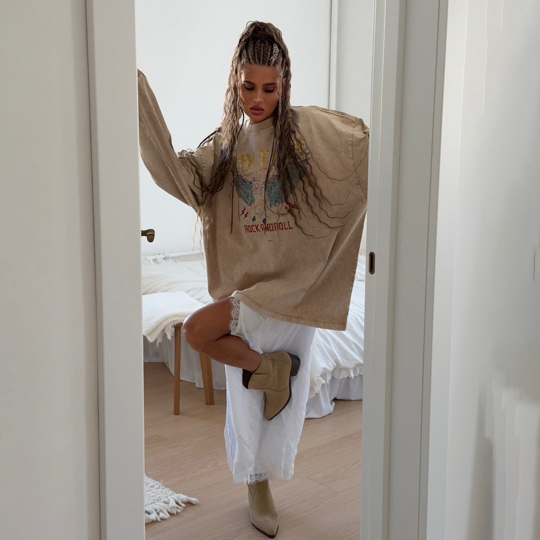 Damer avslappnad oversized sweatshirt med kreativ grafisk design Mirla-Eva Jonsson