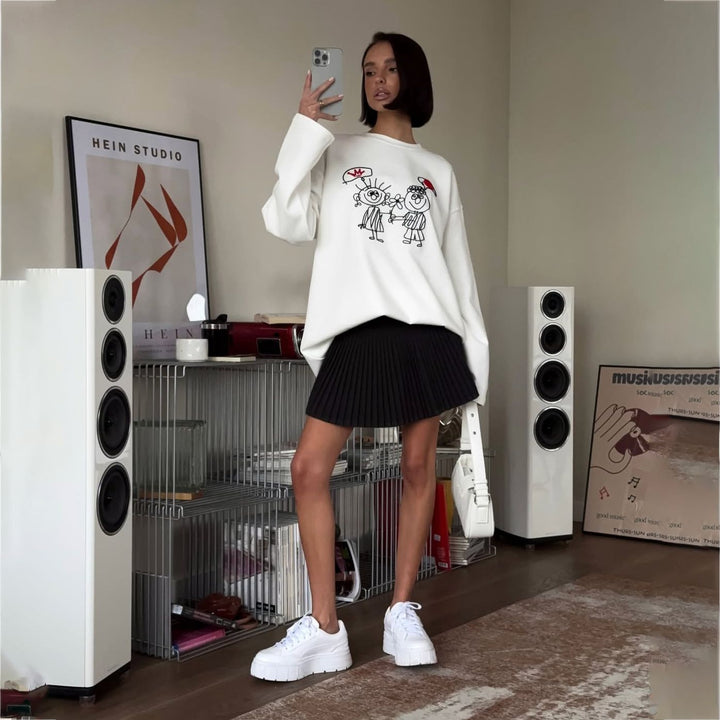 Damer avslappnad oversized sweatshirt med kreativt cartoon-design Mirla-Eva Jonsson
