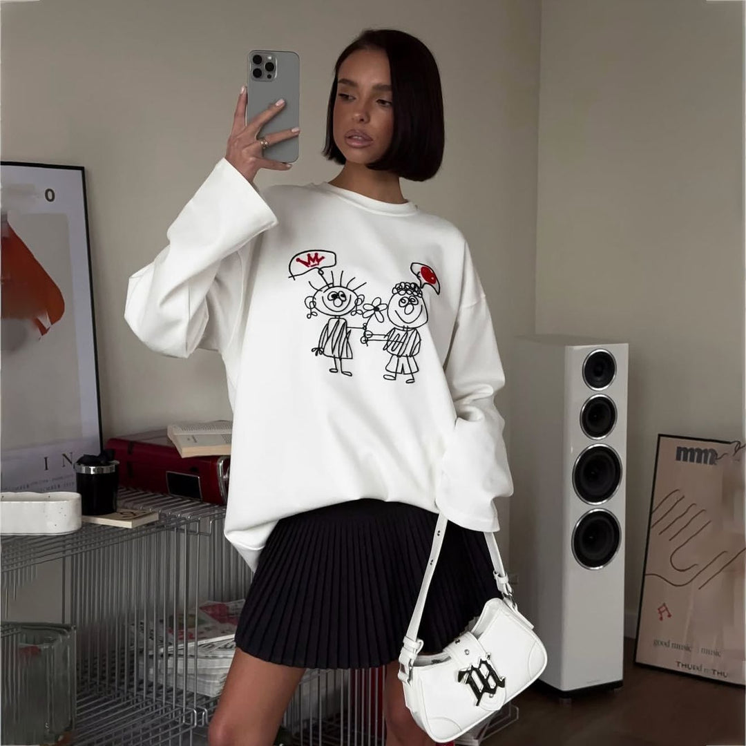 Damer avslappnad oversized sweatshirt med kreativt cartoon-design Mirla-Eva Jonsson