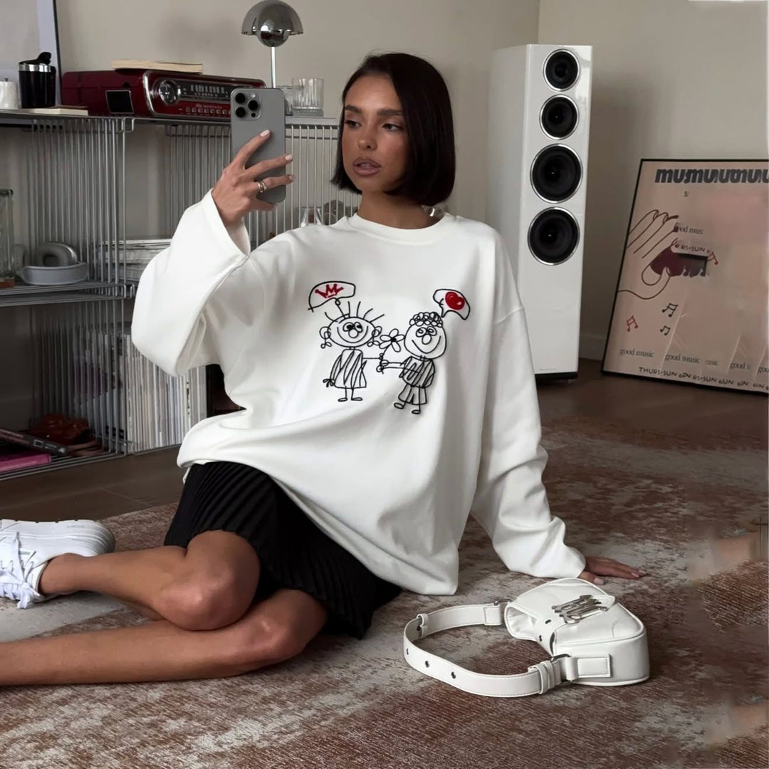 Damer avslappnad oversized sweatshirt med kreativt cartoon-design Mirla-Eva Jonsson