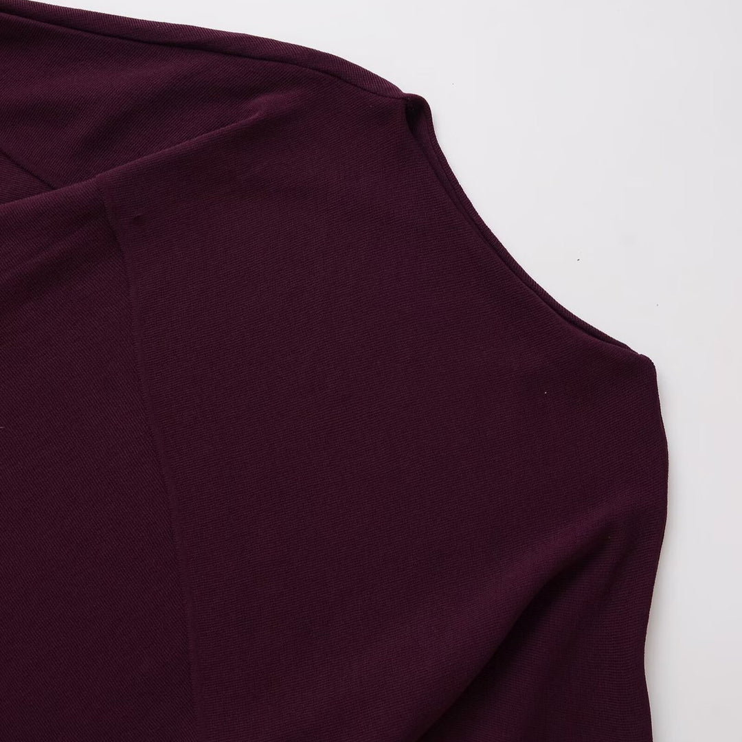 Damer avslappnad oversized topp med asymmetrisk design och vida ärmar Mirla-Eva Jonsson