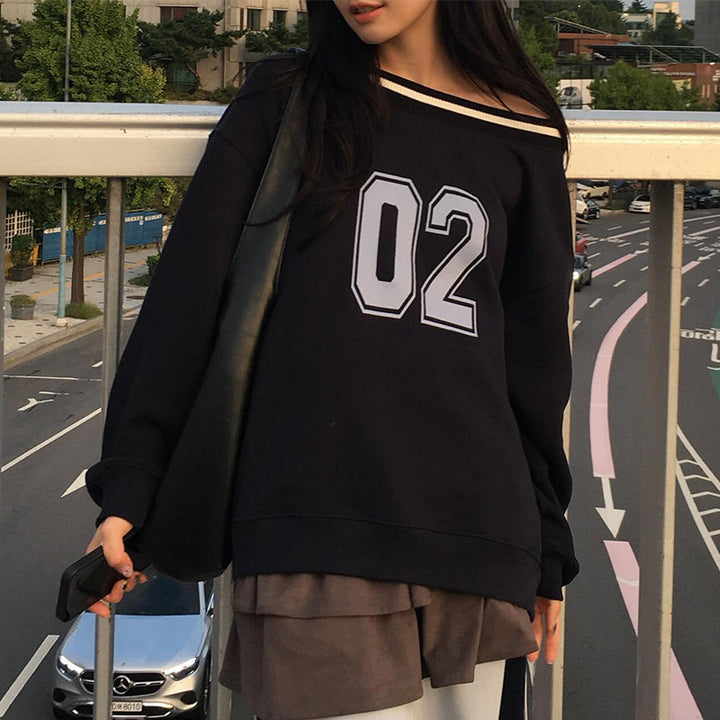 Damer avslappnad oversized tröja med sportig tryck Mirla-Eva Jonsson