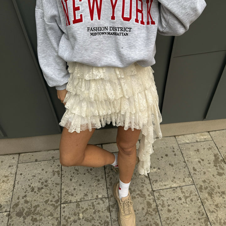 Damer avslappnad oversized-tröja med urban text Mirla-Eva Jonsson