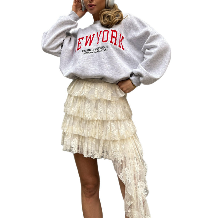 Damer avslappnad oversized-tröja med urban text Mirla-Eva Jonsson