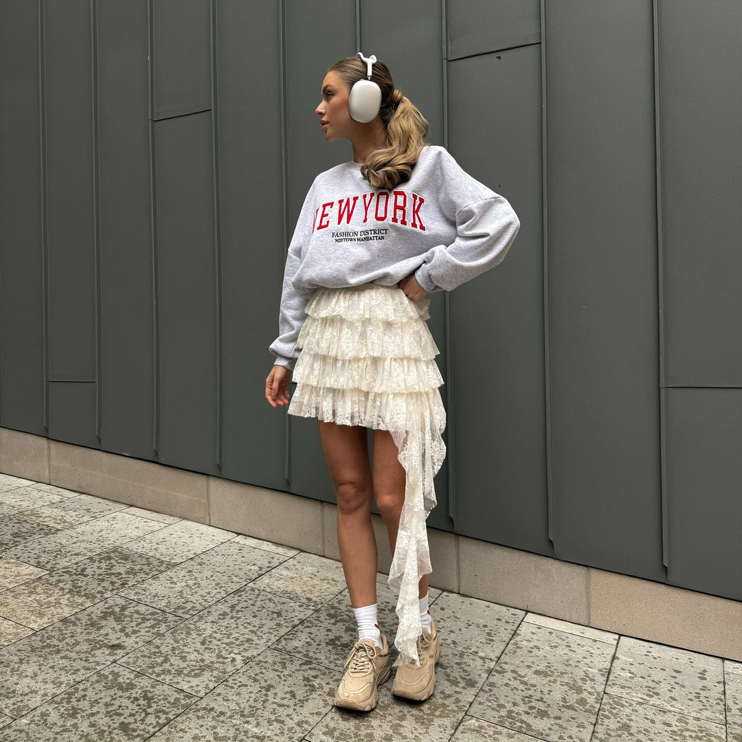 Damer avslappnad oversized-tröja med urban text Mirla-Eva Jonsson