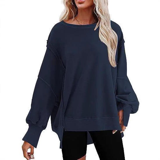 Damer avslappnad oversized tröja med voluminösa ärmar Mirla-Eva Jonsson