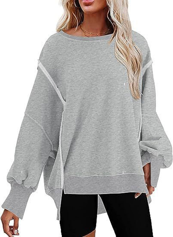 Damer avslappnad oversized tröja med voluminösa ärmar Mirla-Eva Jonsson